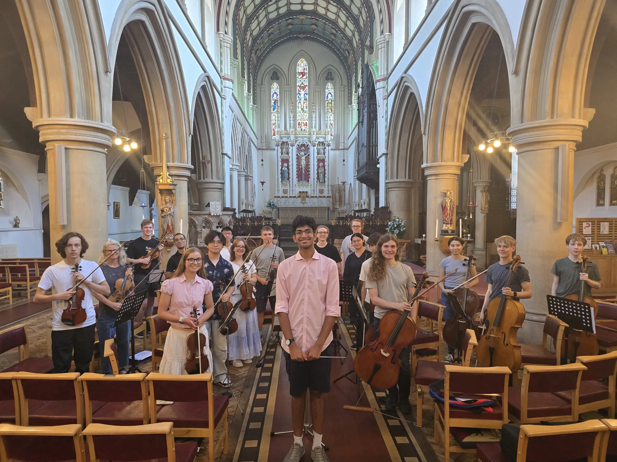 The full orchestra together for a group photo after a concert